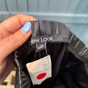 New Look Sleek Black faux leather pants new with tags with slit